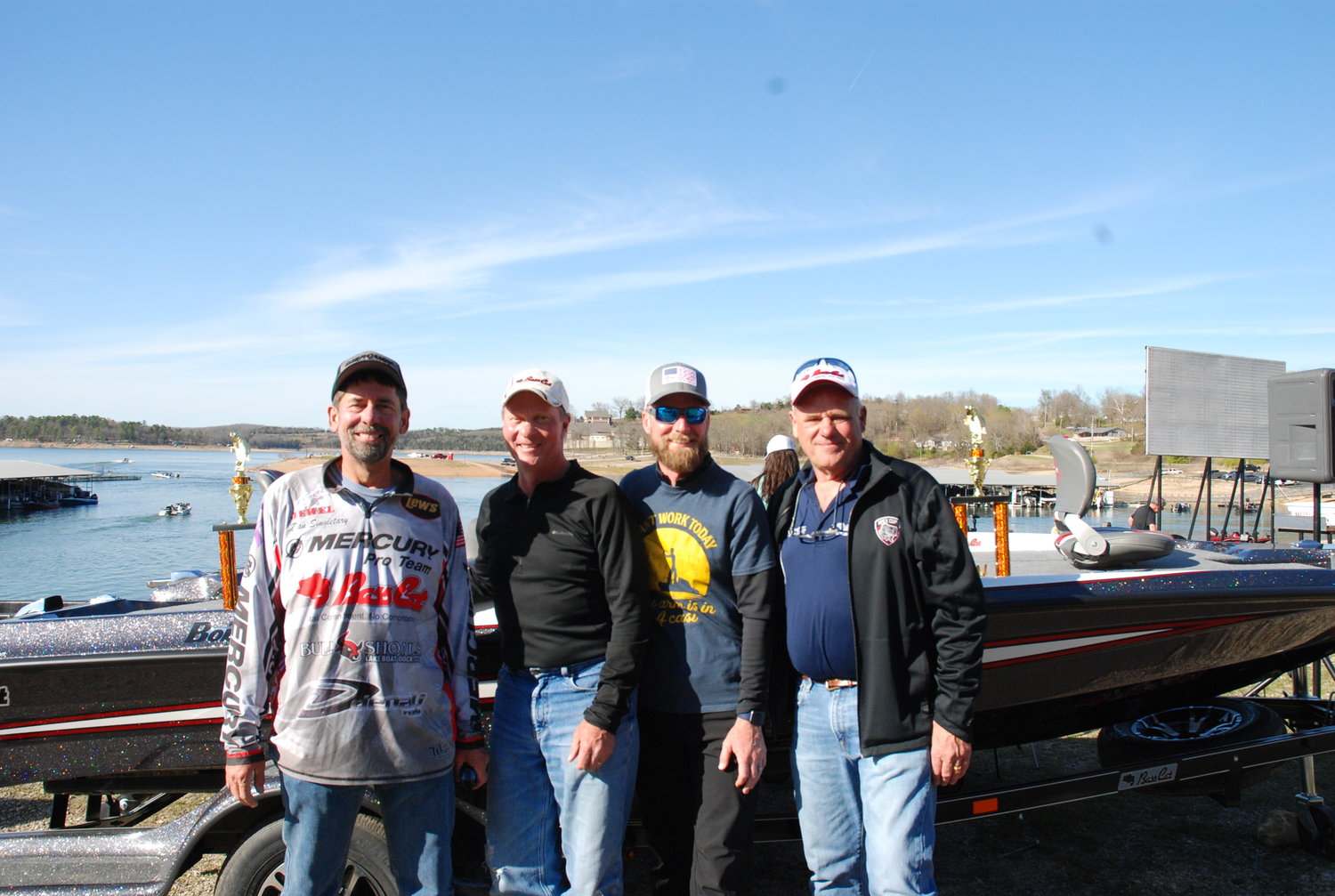 Dan Singletary, Tournament Director, 1st place winners Rick and Jason Schmeski and Rick Pierce, BassCat Boats.